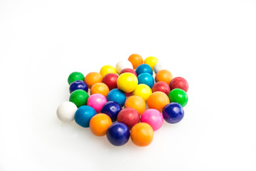 Pile of colored gumballs.