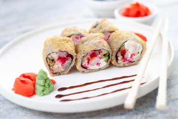 Sushi Rolls asian food stylish beautiful close up picture. Tasty delishes meals with rice and seafood on the white plate