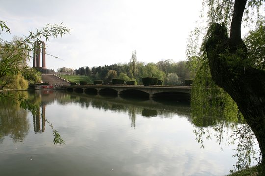 Arch Bride Over Lake At Carol Park Against Sky