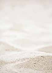blurred of the sea and sand in the summer for abstract background