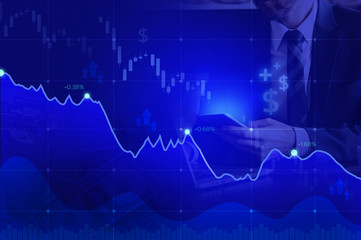stock market on blue color and hand mobile.