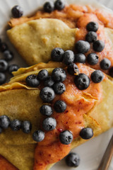 Pancakes with berries close-up.