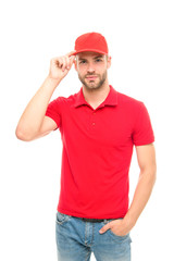Ready to serve you. Man delivery service. Guy in red cap isolated on white background. Express courier service. Shipping and delivery service. Post worker. Help with relocation and move out
