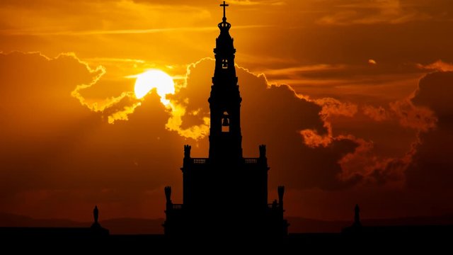 Sanctuary of Our Lady of Fatima, Time Lapse at Sunset with Red Sun and Fiery Sky, Portugal