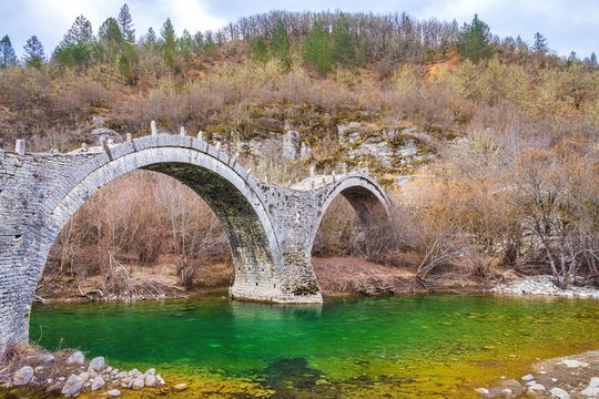 The famous old stone bridge of Kalogeriko or Plakida near the village of Kipoi, one of the 46 villages of Zagorochoria in Epirus Pindos Greece