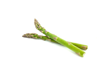 Fresh green asparagus isolated on white background. Creative healthy food concept. Flat lay.