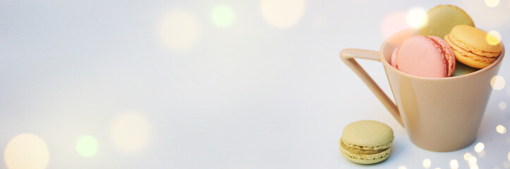 Spring background with blossom and macaroon