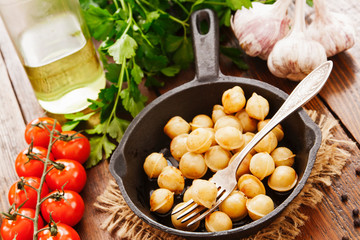 Delicious dumplings in the frying pan