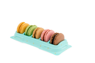 Macaroons in a box isolated