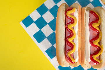 classic hot dogs with ketchup and mustard with space for creators