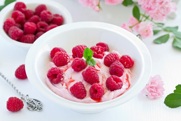 Creamy curd mousse with raspberries. Healthy breakfast.