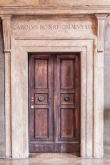 old wooden door in a stone wall