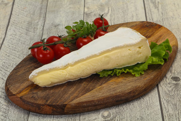 Brie cheese triangle served salad