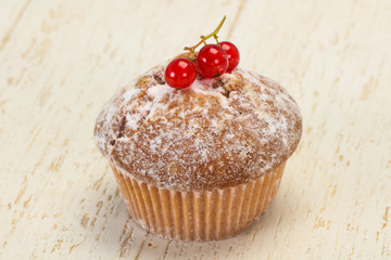 Sweet tasty muffin with red currants