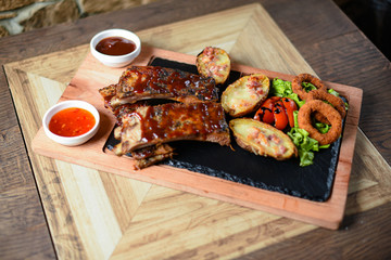 ribs with potatoes and squid rings