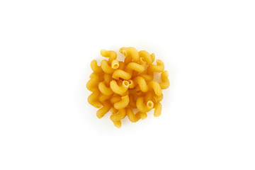 Heap of italian raw dry pasta cellentani isolated on white background. top view