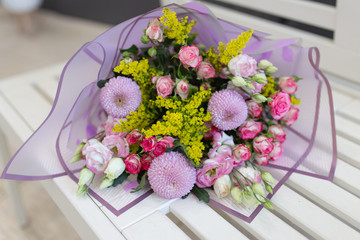 A nice bouquet of fresh flowers (Colors: Lilac, yellow, pink. Flowers: rose, chrysanthemum,...