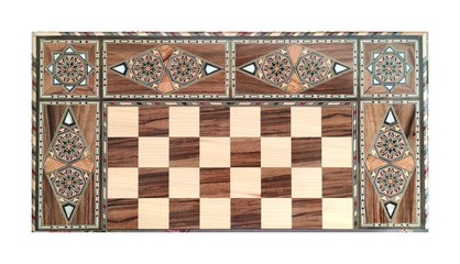 Backgammon with wooden inlay. Wooden backgammon board game of pearl inlaid on brown background.