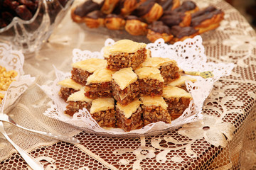 The sweets on the table are beautifully decorated