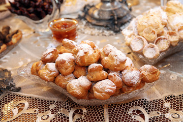 The sweets on the table are beautifully decorated