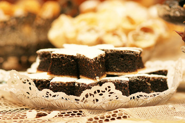 The sweets on the table are beautifully decorated