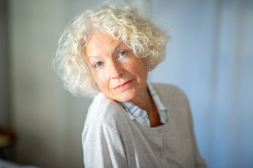 Close up beautiful older woman staring