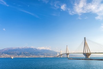 The famous cable bridge Charilaos Trikoupis in Rio Antirio Greece on a sunny day with a blue sky