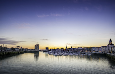 Old harbour of La Rochelle, France at sunset