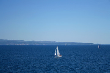 Fototapeta premium Sailing boat on the sea in southern Dalmatia region in Croatia. Beautiful landscape and bright summer day.