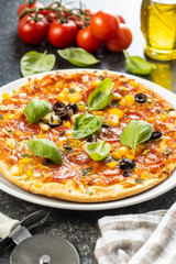 Tasty salami pizza.