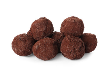 Tasty chocolate truffle candies isolated on white