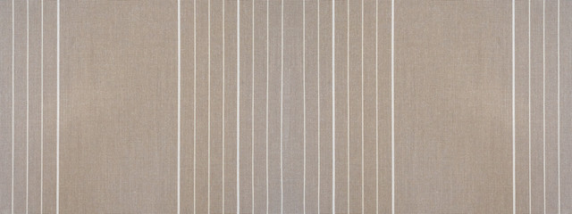 Pastel beige Brown white striped natural cotton linen textile texture background banner panorama 
