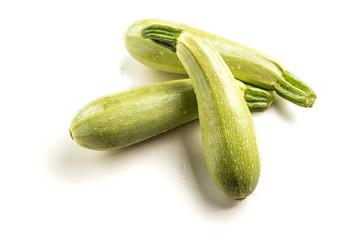 Fresh vegetable zucchini. Isolated on a white background. Squash. Dietary product. Of natural vegetables.