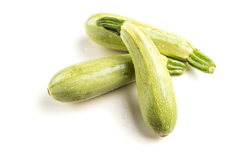 Fresh vegetable zucchini. Isolated on a white background. Squash. Dietary product. Of natural vegetables.