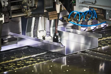 Fototapete Panel bending machine at work. process of metal sheet forming © Kadmy