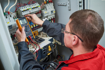 electrician measurements with multimeter tester