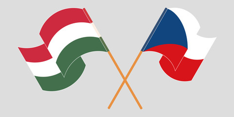 Crossed and waving flags of Hungary and Czech Republic
