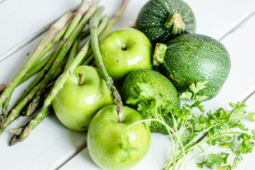 GREEN FRUITS AND VEGETABLES WITH VITAMINS FOR HEALTY DIET