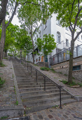 Paris, France - 05 09 2020: Montmartre district. Stone staircase during confinement against coronavirus