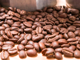 Organic coffee beans on wooden table