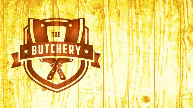 rider west fancy emblem for murder with retro part and meat dagger on timber texture background