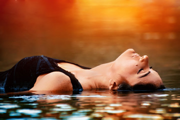 young woman relaxing in spa