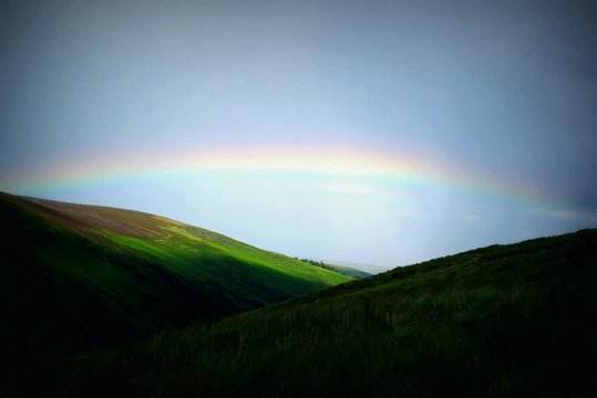 Rainbow Above Green Mountains