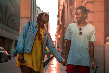 A young couple travelling in the city