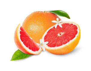 Whole and cut grapefruits on white background