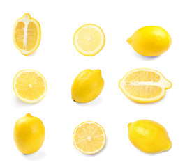 Set of delicious lemons on white background, top view