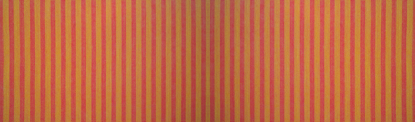 Red orange yellow striped natural cotton linen textile texture background banner panorama 