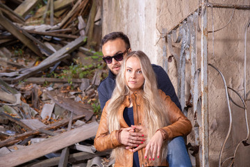 handsome couple portrait on grunge urban background