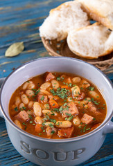 Baked beans in tomato sauce with chopped sausage