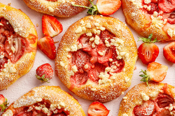 Strawberry crumble yeast sweet  buns, top view. Traditional kolaches